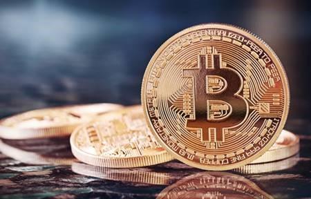 Virtual currencies: the Bitcoin symbol on a green background with figures Crypto