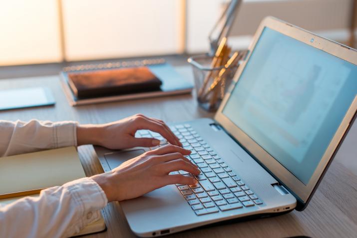 Jobs: the hands of a woman typing on a laptop